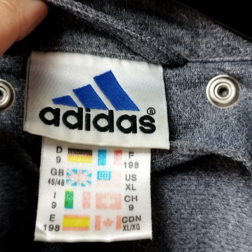 Vintage Adidas men's short sleeve tracktop from 1990, used, size XL