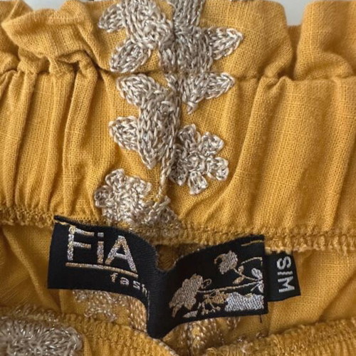FIA fashion set gold like new, size S/M