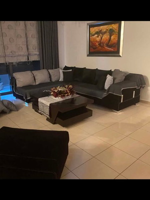 Corner sofa new, modern black design, spacious and comfortable