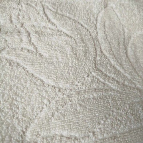 Klotsotiras face towel like new with embossed design
