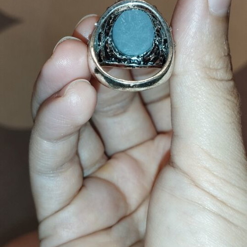 Statement cocktail ring with large red stone and rhinestones