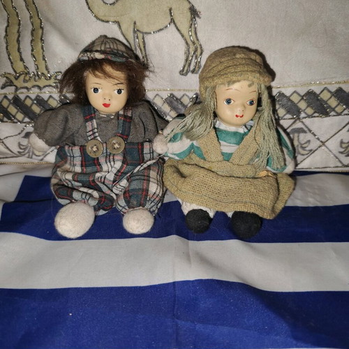 Vintage collectible dolls used with porcelain faces and fabric bodies