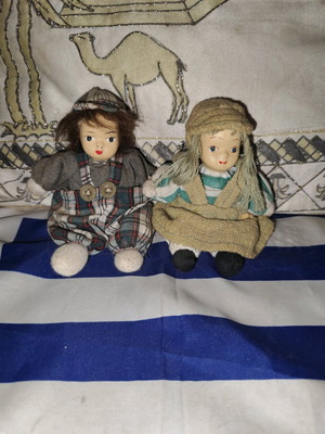 Vintage collectible dolls used with porcelain faces and fabric bodies