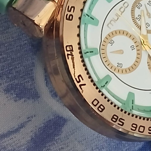 Mulco wristwatch turquoise and gold, used with minor wear