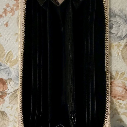 Pink straw wallet used with multiple card slots