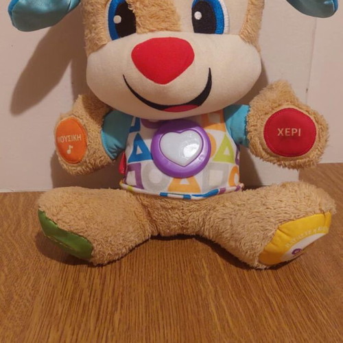 Fisher Price educational puppy used with music and sounds