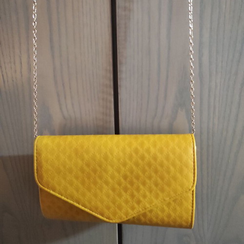 Women's mango yellow envelope bag with quilted surface and gold chain