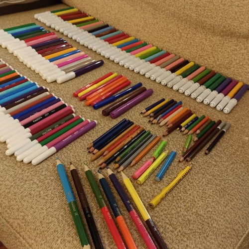 Painting set used with colored pencils and markers