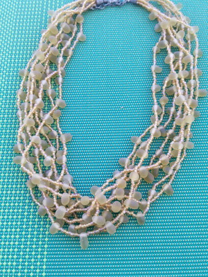 Necklace new with yellow stone and multiple strands with great clasp