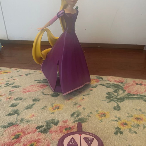 Princess Rapunzel with remote control like new