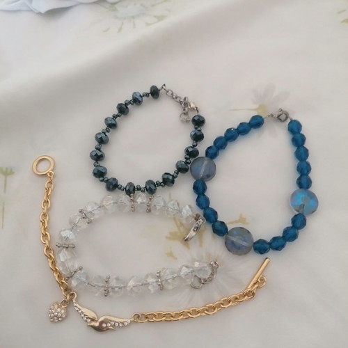 Bracelets used, set of 4 with crystal stones and one metal