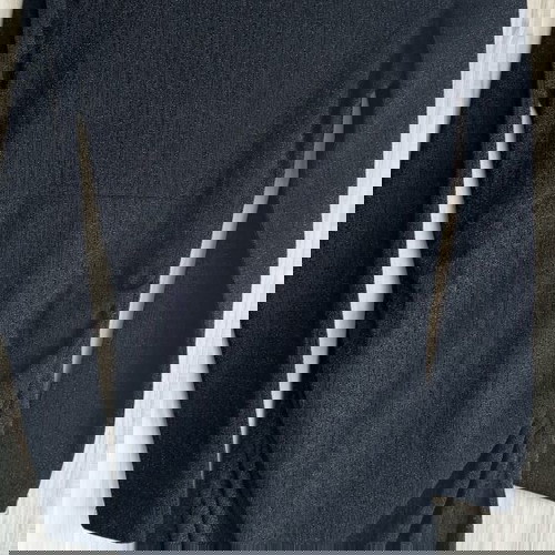 Reserved black dress like new with long sleeves and draping, size M