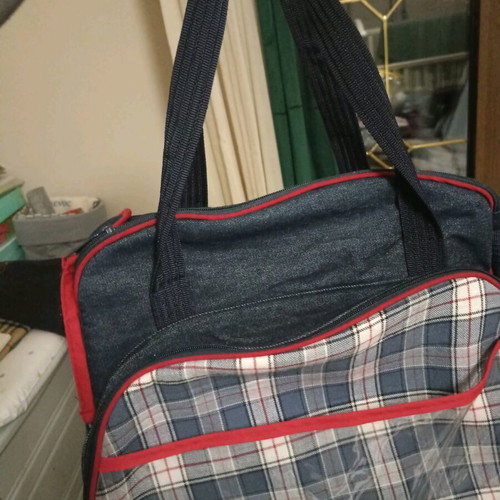 Baby outing bag used with many compartments and changing mat