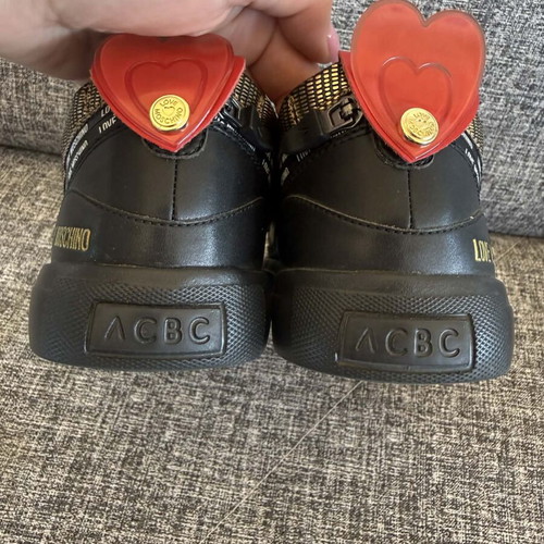 Love Moschino women's sneakers size 39 like new, black and gold