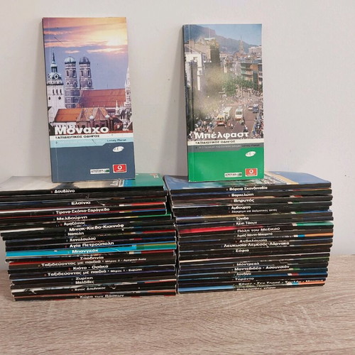 Loney Planet travel guides like new pack of 42
