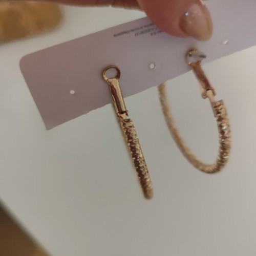 Earrings in gold color like new, medium size hoops