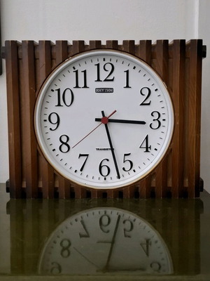 Vintage Rhythm wall clock used with wooden design