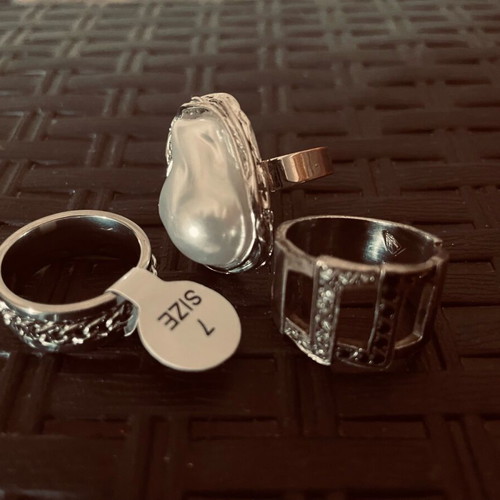 Rings size 7 like new, silver, adjustable