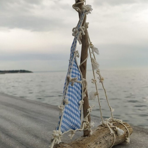 Decorative handmade boat new with driftwood