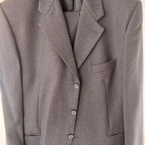 Suit new, black, jacket size 58 and trousers size 52