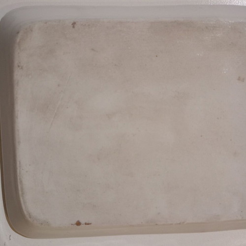 Porcelain tray used with flowers and golden accents