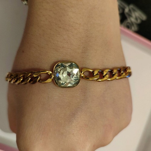 Steel bracelet with stone like new, gold color