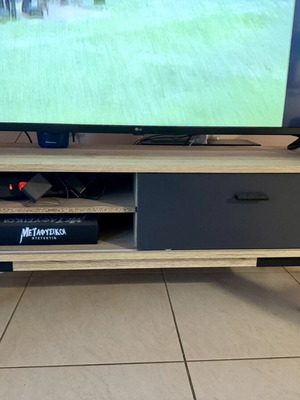 TV stand like new, natural wood with black cabinet and legs