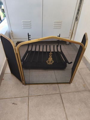 Iron fireplace grate with ash pan and screen