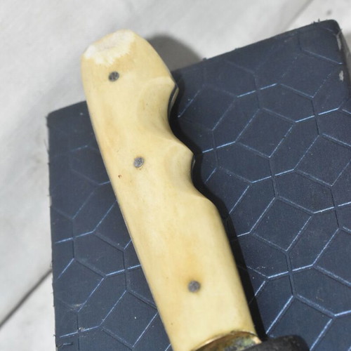 Decorative knife with engraved dedication and handmade sheath used