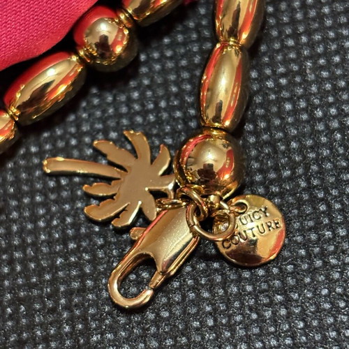 Juicy Couture necklace like new, gold color, 84 cm length
