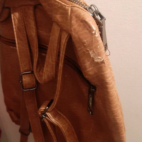 Backpack used with minor scratch on side
