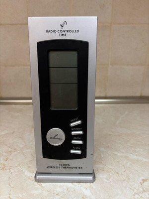 Wireless digital weather station used with radio-controlled clock