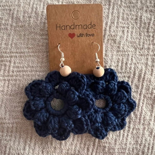 Handmade crochet flower-shaped earrings in navy blue