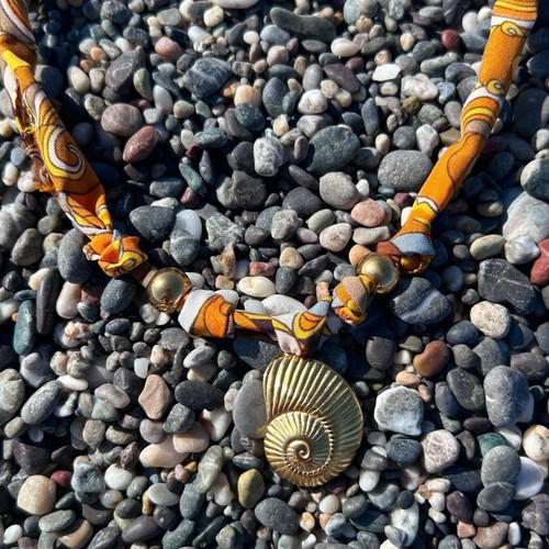 Summer necklace with steel elements on fabric strip