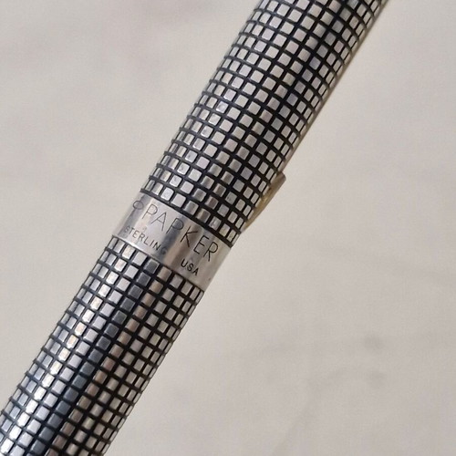 Parker pen in like new condition, possibly silver or silver-plated