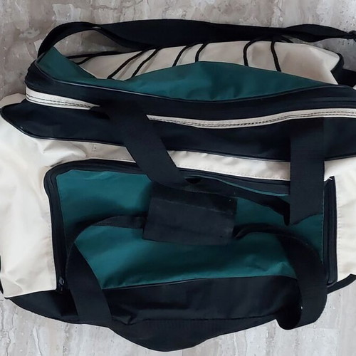 Travel bag large with central and side pockets used, black beige green