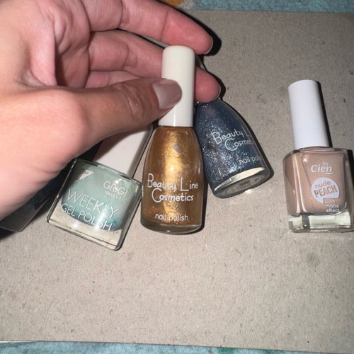 Nail polishes new, pack of 5 with blue, gold and nude shades