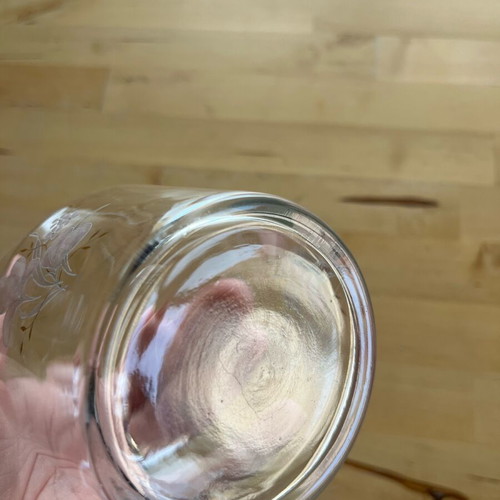 Glass bulb vase used with botanical detail