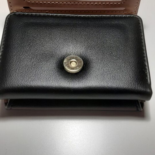 Black wallet new with gold emblem and beige lining