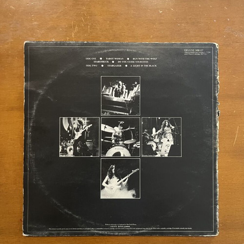 Rainbow Rising LP used with visible cover marks, excellent disc condition
