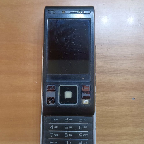 Sony Ericsson C905 used, non-working, with charger and USB cable