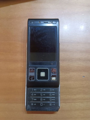 Sony Ericsson C905 used, non-working, with charger and USB cable