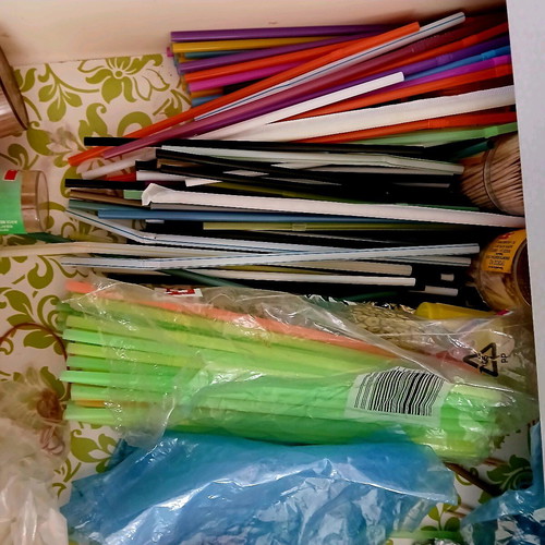 Package of plastic straws vintage like new