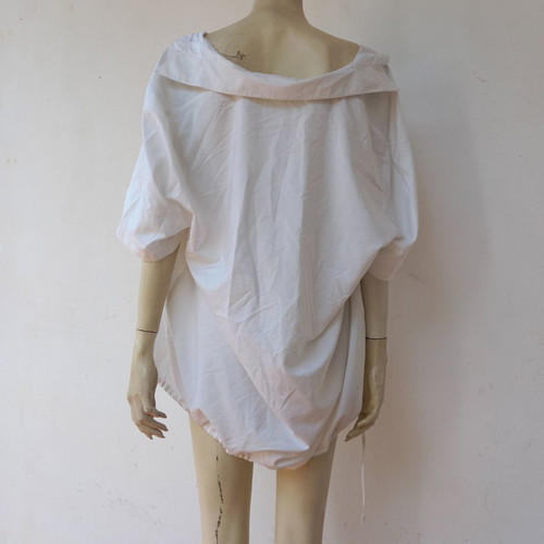 Oversize white shirt used with drawstring detail