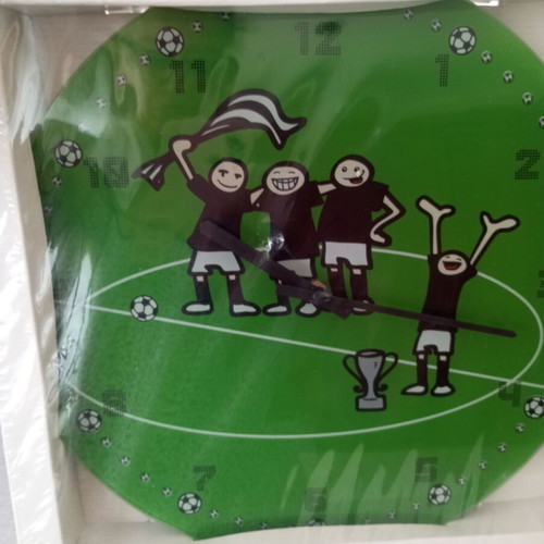 Wall clock with football theme, quartz mechanism, glass/plastic surface