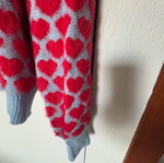 Milk white sweater like new with hearts, blue and pink