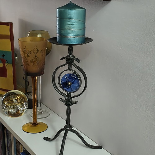 Handmade metal candlestick with blue glass detail, like new