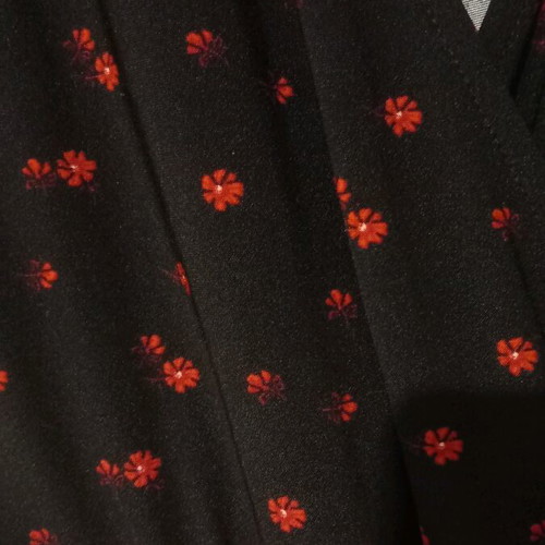 Black short dress with red flowers used