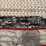 Men's surf style swim shorts striped white black with red cord size L used
