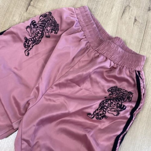 Pink sweatpants with black tiger graphic